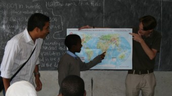 Where in the world: A student at Uhuru Peak School in Arusha, Tanzania shows IBM’s Corporate Service Corps team how far we had come from our homes to get to Tanzania—and our discussions showed how alike we all are in our hopes and dreams. Working with local schools, providing lessons and materials such as books and maps, was an important part of our community outreach while in-country.